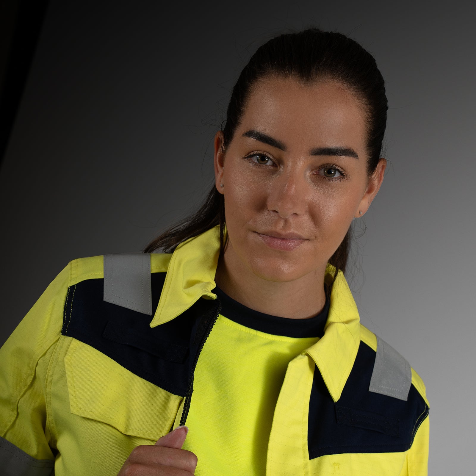 Female model in Safety wear by Tricorp
