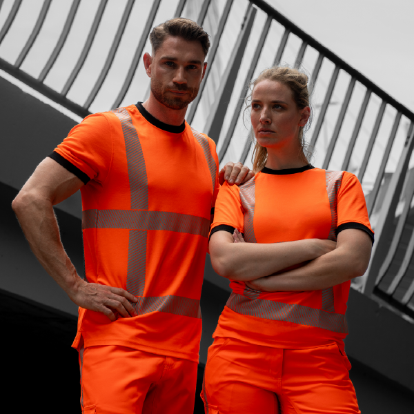 Female and male model wearing high visibility outfit