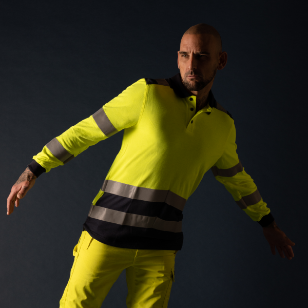 Male model wearing Tricorp multi standard polo